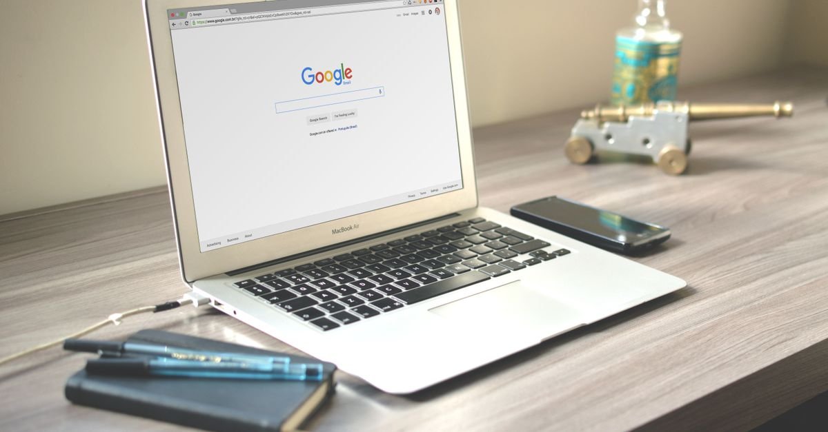 Searching Google for a website on a laptop